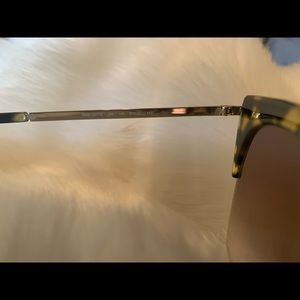 This is a pair of Rag’n’Bone Sunglasses description Animal Print